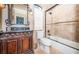 Bathroom with a shower/tub combo, toilet and vanity at 308 Harbor Dr, Indian Rocks Beach, FL 33785