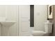 Clean bathroom with pedestal sink and updated toilet at 32109 Spiceberry St, San Antonio, FL 33576