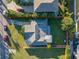 Aerial view showcasing the house, with its roof, driveway, and backyard at 323 30Th N Ave, St Petersburg, FL 33704