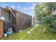 Private backyard with wooden enclosure and lush landscaping at 3529 Windham Dr, Holiday, FL 34691