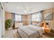Virtually staged bedroom with a bed and wood dresser at 3529 Windham Dr, Holiday, FL 34691