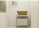 Bright laundry room with shelving and a laundry sorter at 36195 Joseph Blake St, Zephyrhills, FL 33541