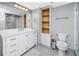 Modern bathroom with white cabinets, a large vanity, and a glass shower at 399 2Nd St # 718, Indian Rocks Beach, FL 33785