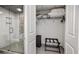Bathroom with walk-in shower, hexagon tile floor, and white vanity with quartz countertop at 399 2Nd St # 718, Indian Rocks Beach, FL 33785