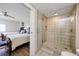 Bathroom with walk-in shower and patterned tile at 399 2Nd St # 718, Indian Rocks Beach, FL 33785