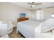 Bright bedroom with a queen bed, and plenty of natural light at 399 2Nd St # 718, Indian Rocks Beach, FL 33785