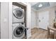 Stackable washer and dryer in convenient entryway closet at 399 2Nd St # 718, Indian Rocks Beach, FL 33785