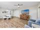 Living room with hardwood floors and comfortable seating at 399 2Nd St # 718, Indian Rocks Beach, FL 33785