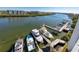 Aerial view of a marina with many boats and docks at 399 2Nd St # 718, Indian Rocks Beach, FL 33785