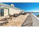 Community patio with seating area and water views at 399 2Nd St # 718, Indian Rocks Beach, FL 33785