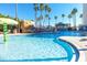 Relaxing resort-style pool with palm trees at 399 2Nd St # 718, Indian Rocks Beach, FL 33785