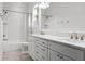 Elegant bathroom with double vanity, subway tile, and a bathtub at 518 Severn Ave, Tampa, FL 33606