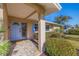 Welcoming front porch with a stone walkway and a light blue door at 5201 42Nd S St, St Petersburg, FL 33711