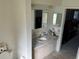 Clean bathroom with a vanity and double mirror at 6708 Canton S St, St Petersburg, FL 33712