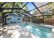 Refreshing pool with a screened enclosure, ideal for Florida living at 675 Avenida Del Norte, Sarasota, FL 34242