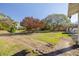 Large backyard with mature trees and open space at 775 Pennsylvania Ave, Palm Harbor, FL 34683