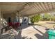 Covered patio with seating area and backyard access at 775 Pennsylvania Ave, Palm Harbor, FL 34683