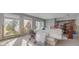 Room under renovation with windows and exposed walls at 775 Pennsylvania Ave, Palm Harbor, FL 34683