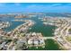 Wide aerial showcasing waterfront home and neighborhood at 826 79Th S St, St Petersburg, FL 33707