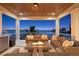 Relaxing waterfront patio with fire pit and seating area at 826 79Th S St, St Petersburg, FL 33707