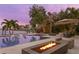 Expansive patio with fire pit and pool at 826 79Th S St, St Petersburg, FL 33707