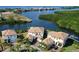 Luxury waterfront homes with private docks and lush landscaping at 1109 Seagrape Dr, Ruskin, FL 33570