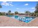 Resort-style pool with plenty of lounge chairs at 12772 Tripoli Ave, Riverview, FL 33579