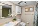 Bathroom with double vanity and shower at 147 Bluff View Dr # 204, Belleair Bluffs, FL 33770