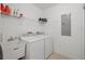 Laundry room with washer, dryer, and utility sink at 17715 Gulf Blvd # 204, Redington Shores, FL 33708