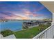 Stunning sunset view over the marina from private balcony at 17715 Gulf Blvd # 204, Redington Shores, FL 33708