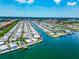 Aerial view of waterfront community with many homes and canals at 18675 Us Highway 19 N # 389, Clearwater, FL 33764