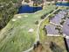 Aerial view of golf course homes and landscape at 2493 Kensington Greens Dr # 2493, Sun City Center, FL 33573