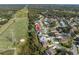 Aerial view of a house in a residential neighborhood near a golf course at 4889 Edgewater Ln, Oldsmar, FL 34677