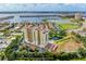 Scenic aerial view showcasing the building, waterways, marina, and the surrounding neighborhood at 501 Haben Blvd # 806, Palmetto, FL 34221