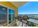 Condo balcony with seating offers lovely panoramic views at 501 Haben Blvd # 806, Palmetto, FL 34221