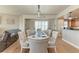 Formal dining room with seating for eight and decorative wall art at 501 Haben Blvd # 806, Palmetto, FL 34221