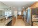Modern kitchen featuring stainless appliances, tile flooring, and an open layout at 501 Haben Blvd # 806, Palmetto, FL 34221