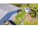 Aerial view of a home's backyard, including a shed and partially fenced area at 6315 51St N Ave, St Petersburg, FL 33709