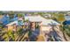Luxury waterfront home with attached two-car garage and mature landscaping at 937 Bunker View Dr, Apollo Beach, FL 33572