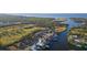 Aerial view highlighting the property's waterfront location and surrounding landscape at 937 Bunker View Dr, Apollo Beach, FL 33572