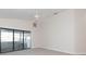 Bedroom with sliding glass doors leading to patio at 937 Bunker View Dr, Apollo Beach, FL 33572