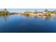 Serene waterfront view with neighboring homes and lush vegetation at 937 Bunker View Dr, Apollo Beach, FL 33572