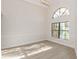 Sunlit dining room featuring hardwood floors and a large window at 937 Bunker View Dr, Apollo Beach, FL 33572