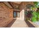 Double door entry with brick facade and tile flooring at 937 Bunker View Dr, Apollo Beach, FL 33572