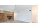 Living room featuring a brick fireplace and laminate flooring at 937 Bunker View Dr, Apollo Beach, FL 33572