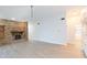 Spacious living room with brick fireplace and vaulted ceiling at 937 Bunker View Dr, Apollo Beach, FL 33572