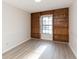 Built-in shelving and hardwood floors in this home office at 937 Bunker View Dr, Apollo Beach, FL 33572