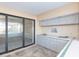 Outdoor kitchen with view of the pool at 937 Bunker View Dr, Apollo Beach, FL 33572