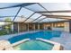 Large, refreshing pool and spa with a covered patio at 937 Bunker View Dr, Apollo Beach, FL 33572