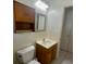 Bathroom with vanity, toilet, and medicine cabinet at 10104 45Th N Way, Pinellas Park, FL 33782